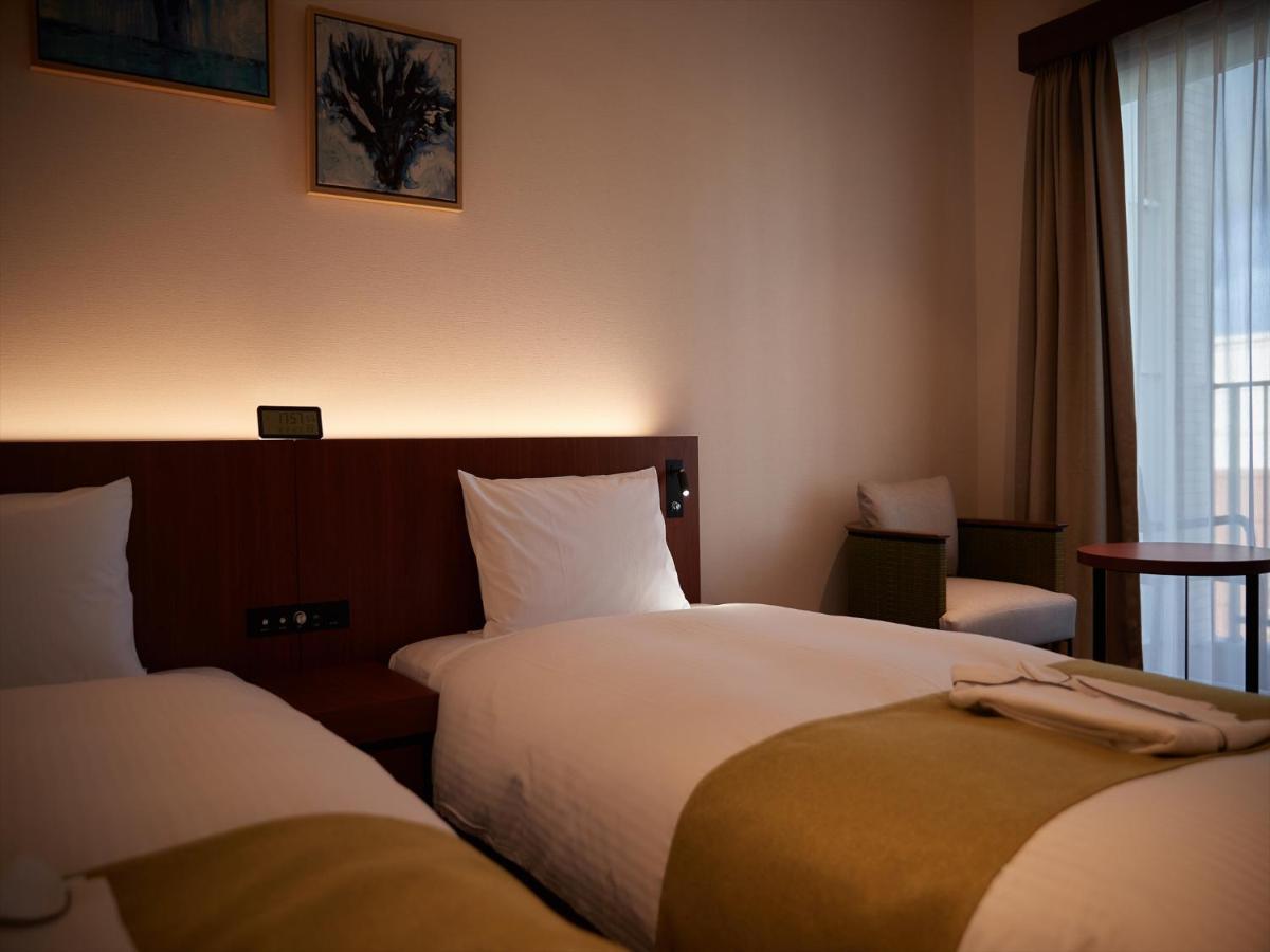 The Grand Hotel غينوان المظهر الخارجي الصورة