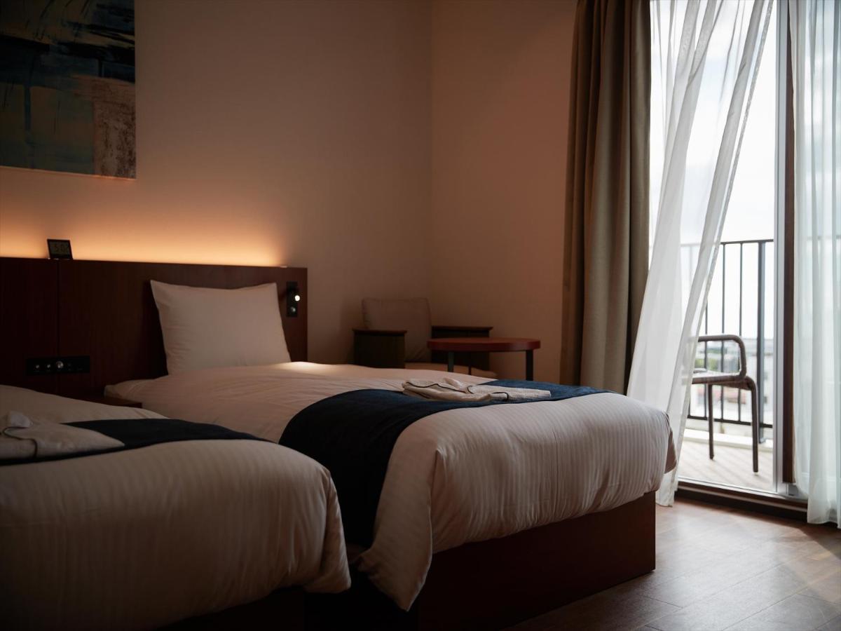 The Grand Hotel غينوان المظهر الخارجي الصورة
