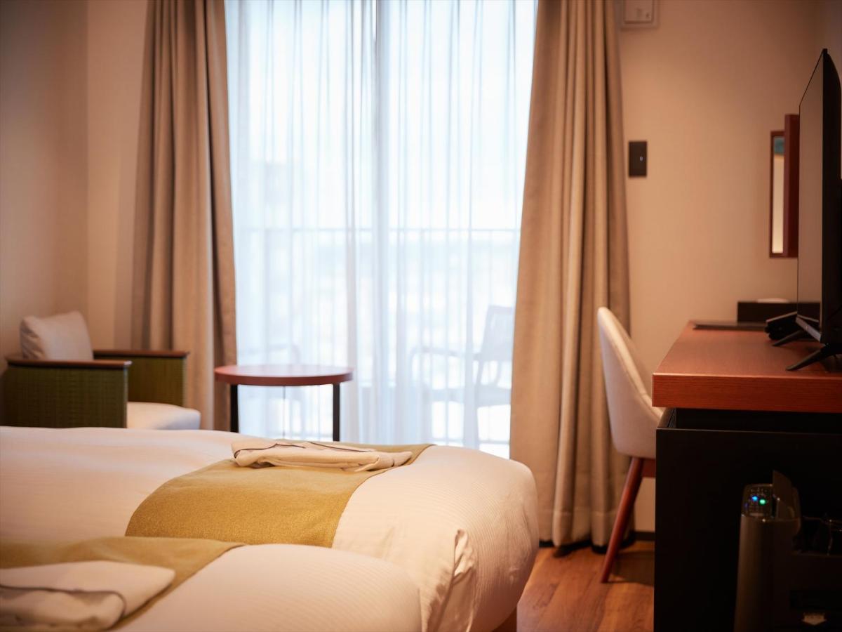 The Grand Hotel غينوان المظهر الخارجي الصورة