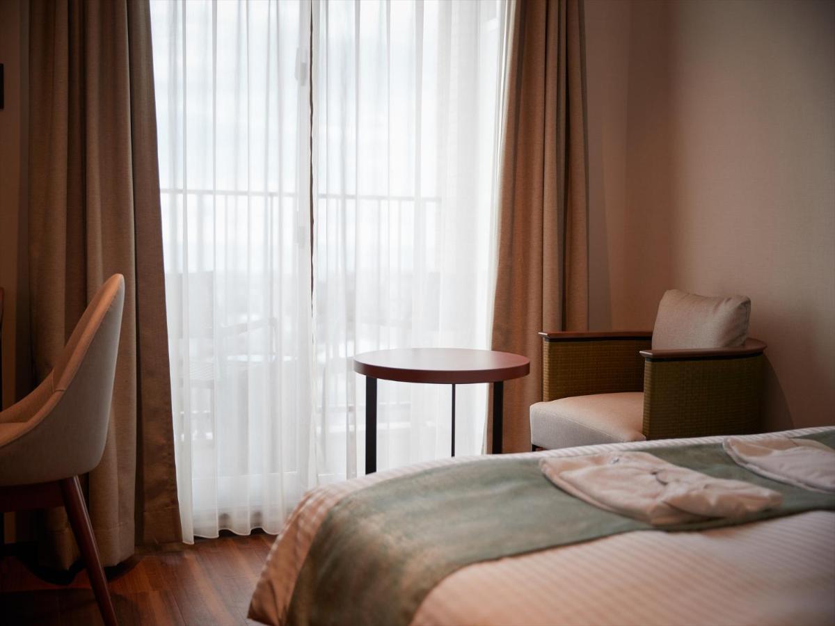 The Grand Hotel غينوان المظهر الخارجي الصورة