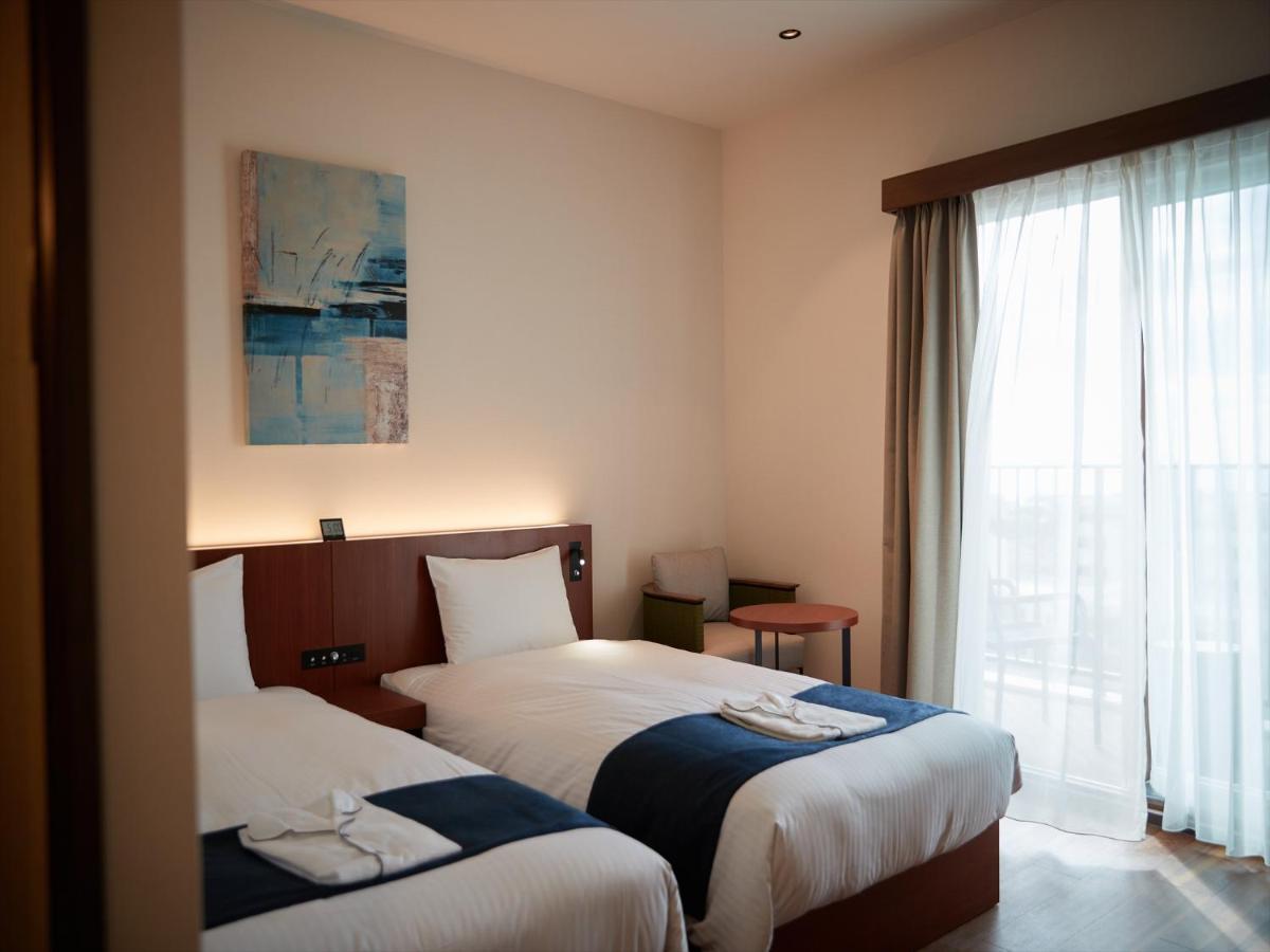 The Grand Hotel غينوان المظهر الخارجي الصورة